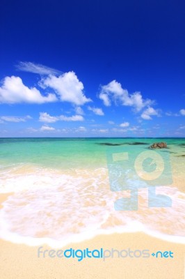 White Sand And Sea Stock Photo