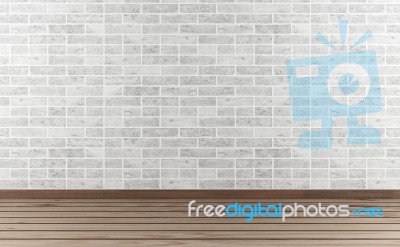 White Stone Wall And Hardwood Floor Stock Image