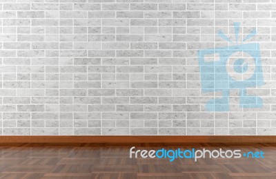 White Stone Wall And Parquet Floor Stock Photo