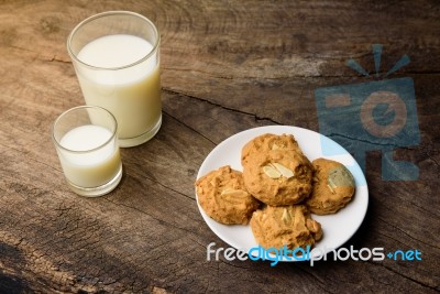 Whole Wheat Almond Cookies With A Glass Of Milk Stock Photo