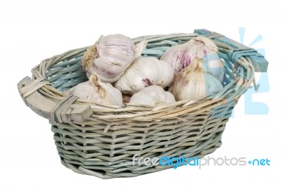 Wicker Basket Full Of Garlic Heads Stock Photo