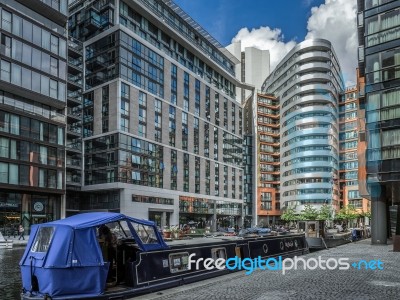 Wide Beamed Boat In Paddington Basin Stock Photo