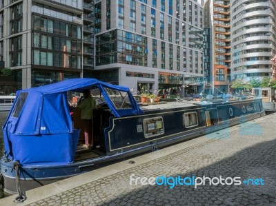 Wide Beamed Boat In Paddington Basin Stock Photo