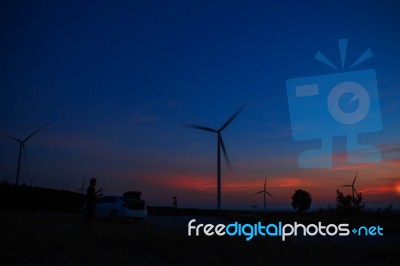 Wind Farm With The Silhouettes Stock Photo