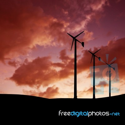 Wind Turbine At Sunset Stock Photo