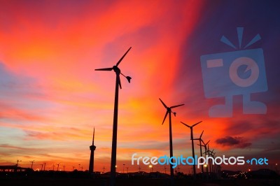 Wind Turbine Silhouettes Stock Photo