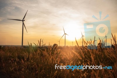 Wind Turbines And Solar Morning Stock Photo