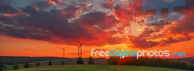 Wind Turbines At The Sunset Stock Photo