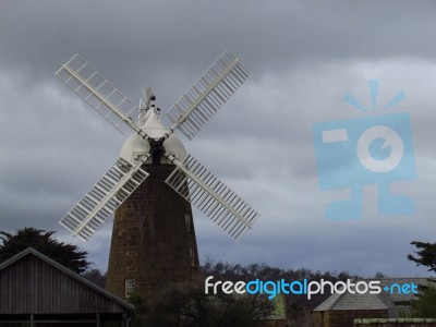 Windmill Against Sky Stock Photo