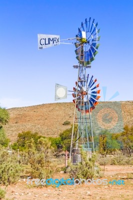 Windmill On The Farm In Namibia Stock Photo