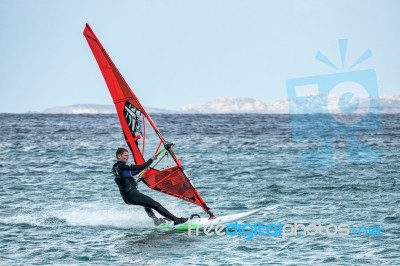 Windsurfing At Porto Pollo In Sardinia Stock Photo