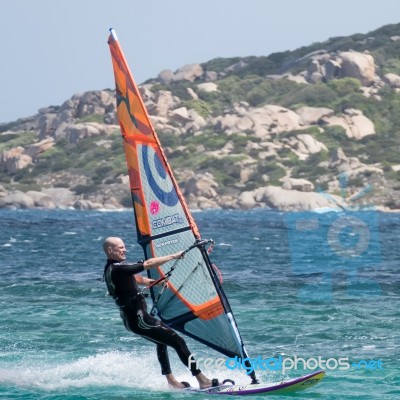 Windsurfing At Porto Pollo In Sardinia Stock Photo