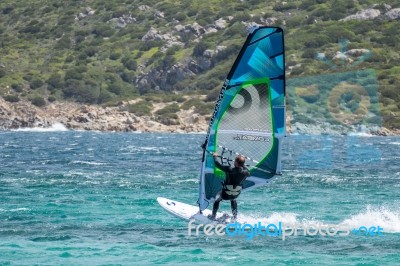 Windsurfing At Porto Pollo In Sardinia Stock Photo