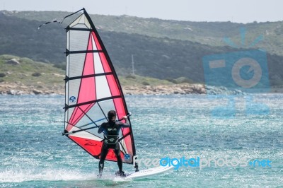 Windsurfing At Porto Pollo In Sardinia Stock Photo