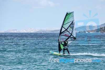 Windsurfing At Porto Pollo In Sardinia Stock Photo