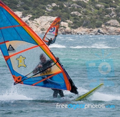 Windsurfing At Porto Pollo In Sardinia Stock Photo