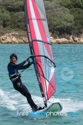 Windsurfing At Porto Pollo In Sardinia Stock Photo