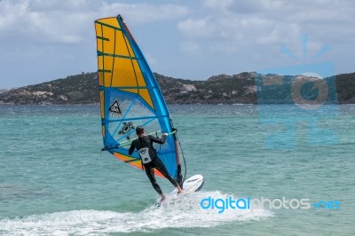 Windsurfing At Porto Pollo In Sardinia Stock Photo