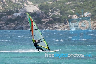 Windsurfing At Porto Pollo In Sardinia Stock Photo