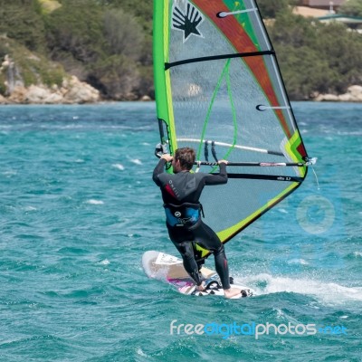 Windsurfing At Porto Pollo In Sardinia Stock Photo