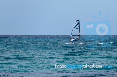 Windsurfing In Sardinia Stock Photo