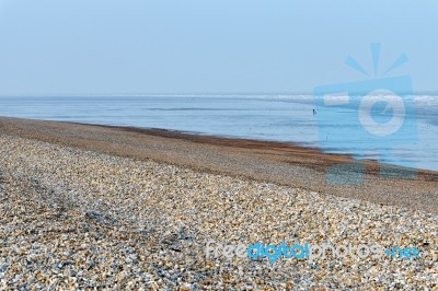 Windswept Desolate Beach At Dungeness Stock Photo