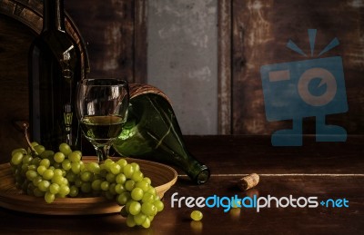 Wine And Grapes On The Table Stock Photo