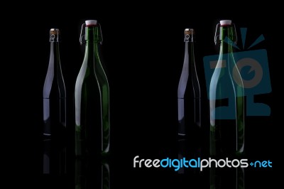 Wine Bottle On Black Stock Photo