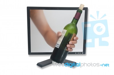 Wine Bottle Through Computer Stock Photo