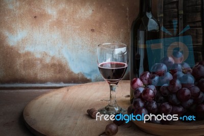 Wine On A Wooden Background Stock Photo