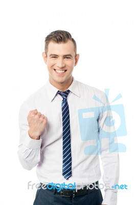 Winning Businessman And Fists Clenched Stock Photo