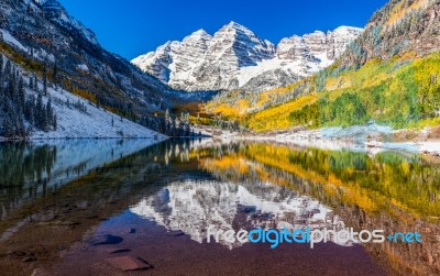 Winter And Fall Foliage In Maroon Bells, Aspen, Co Stock Photo