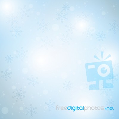 Winter Blue Sky With Falling Snow Stock Image