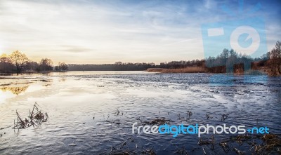 Winter Lake At Sunset Stock Photo