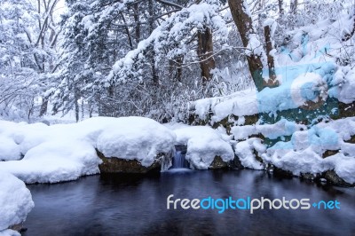 Winter Landscape, Waterfall And River On The Forest In Winter Stock Photo