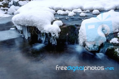 Winter Landscape, Waterfall And River On The Forest In Winter Stock Photo