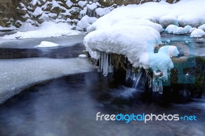 Winter Landscape, Waterfall And River On The Forest In Winter Stock Photo