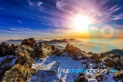 Winter Landscape With Sunset And Foggy In Deogyusan Mountains, South Korea Stock Photo