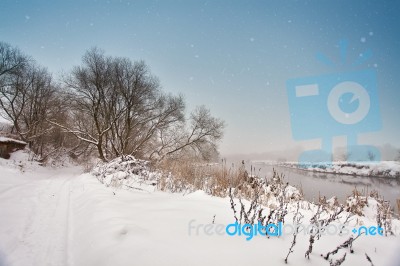 Winter Misty River. Snow And Frost. Overcast Snowy Weather Stock Photo