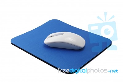 Wireless Mouse On Pad Stock Photo