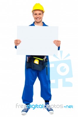 Woker Showing Blank White Board Stock Photo