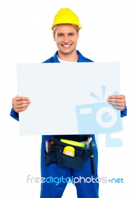 Woker Showing Blank White Board Stock Photo