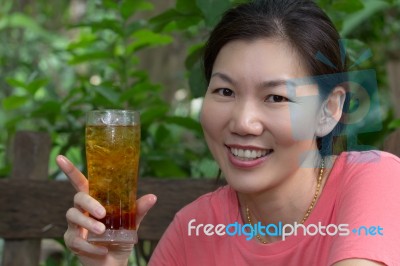 Woman And Cola Stock Photo