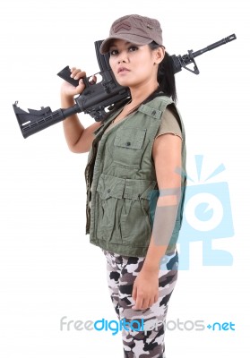 Woman And Rifle Stock Photo