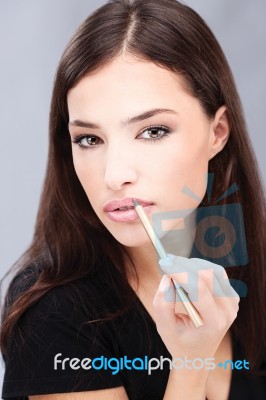 Woman Applying Cosme Stock Photo