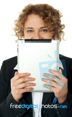 Woman Behind Ipad Stock Photo