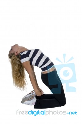 Woman Bending Stretching Her Back Stock Photo