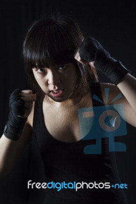 Woman Boxer In Action Stock Photo