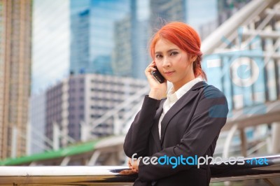 Woman Calling On The Phone Stock Photo