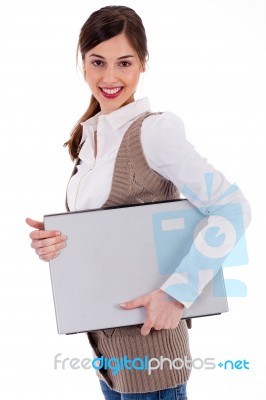 Woman Carrying Laptop Stock Photo